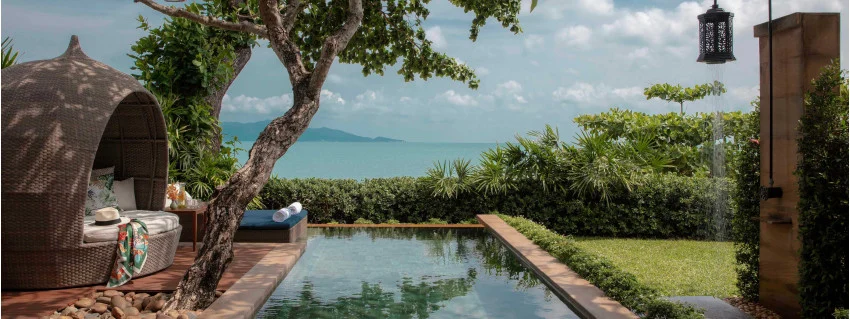 Poolside villa overlooking the sea in Thailand